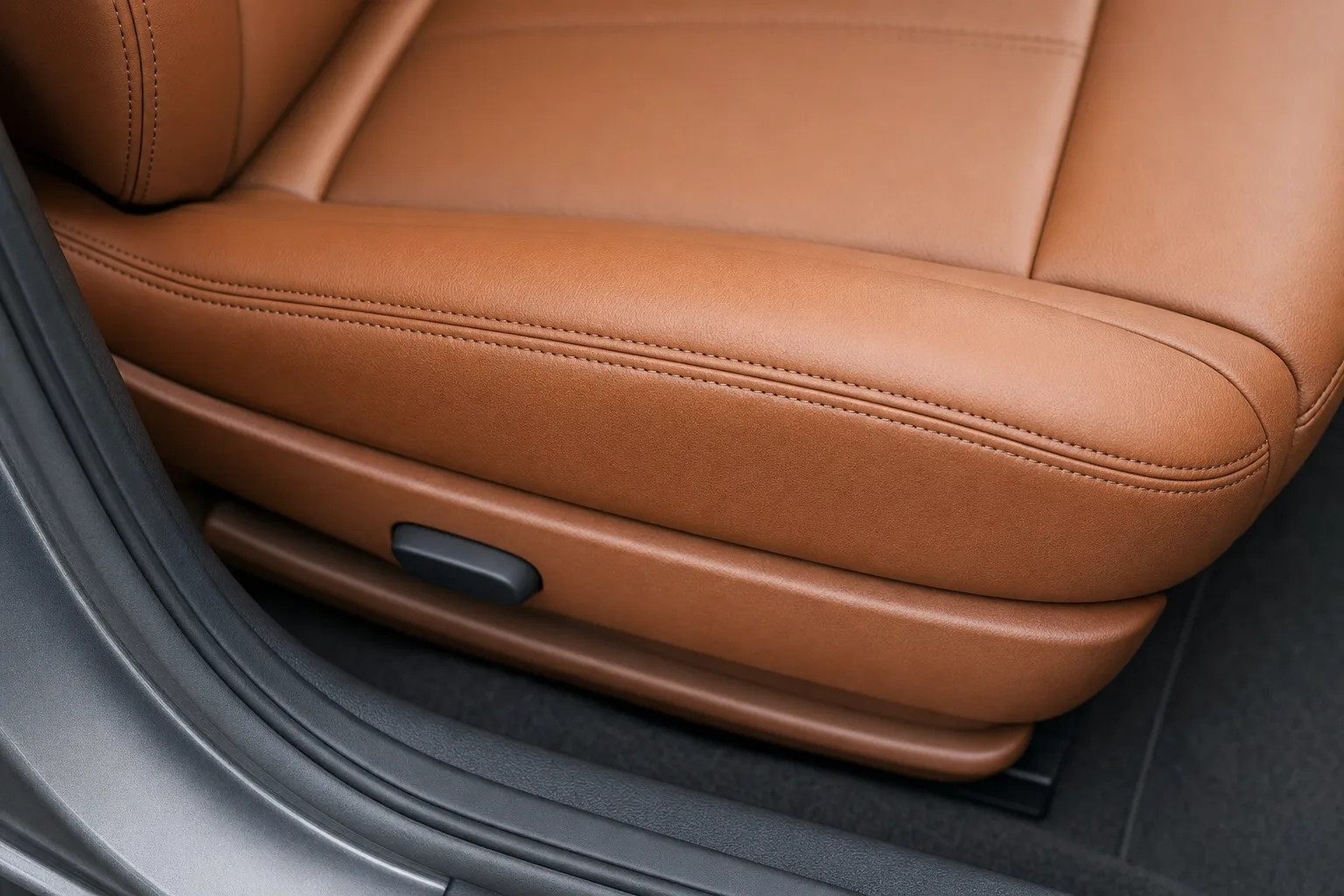 After: Car seat: leather wear & hole repair