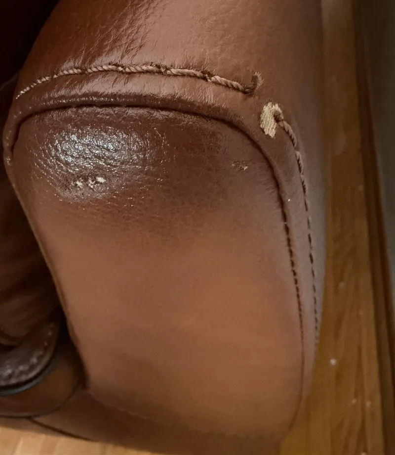 Before: Leather armrest: corner chip repair
