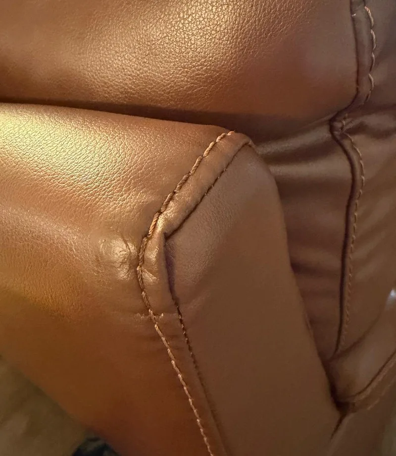 After: Leather armrest: corner seam repair