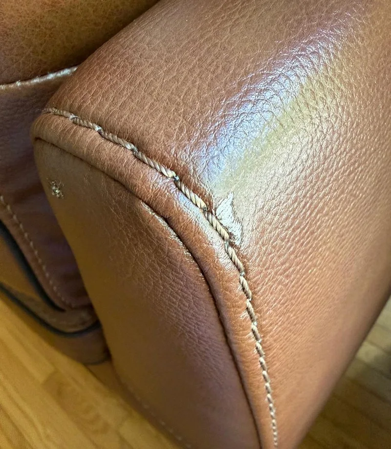 Before: Leather armrest: corner seam repair